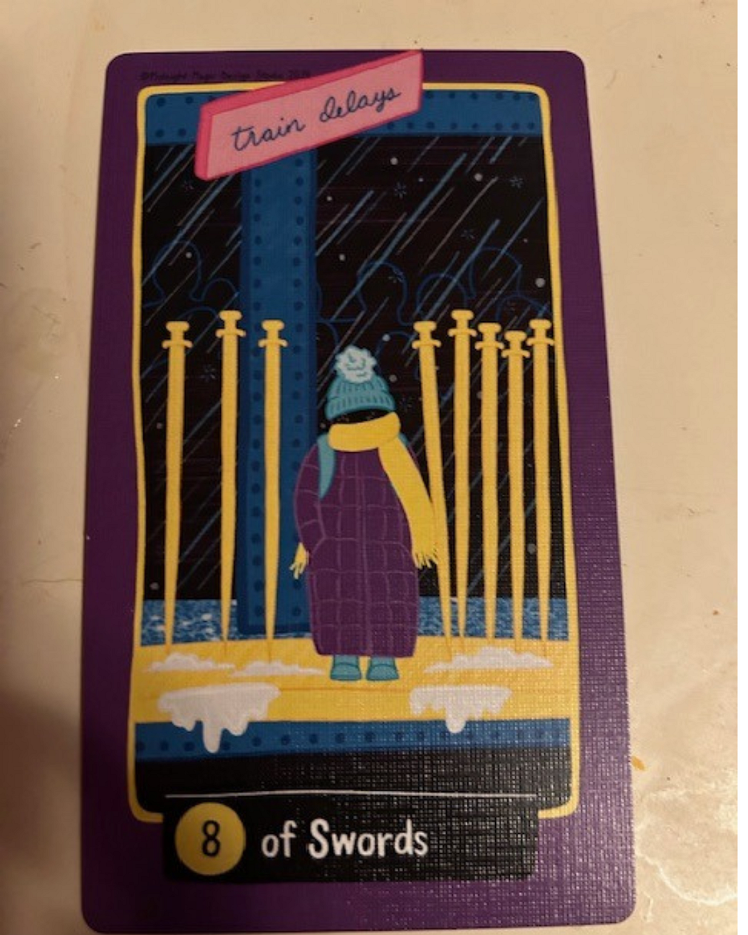 The 8 of Swords from The Midnight City Tarot Deck.